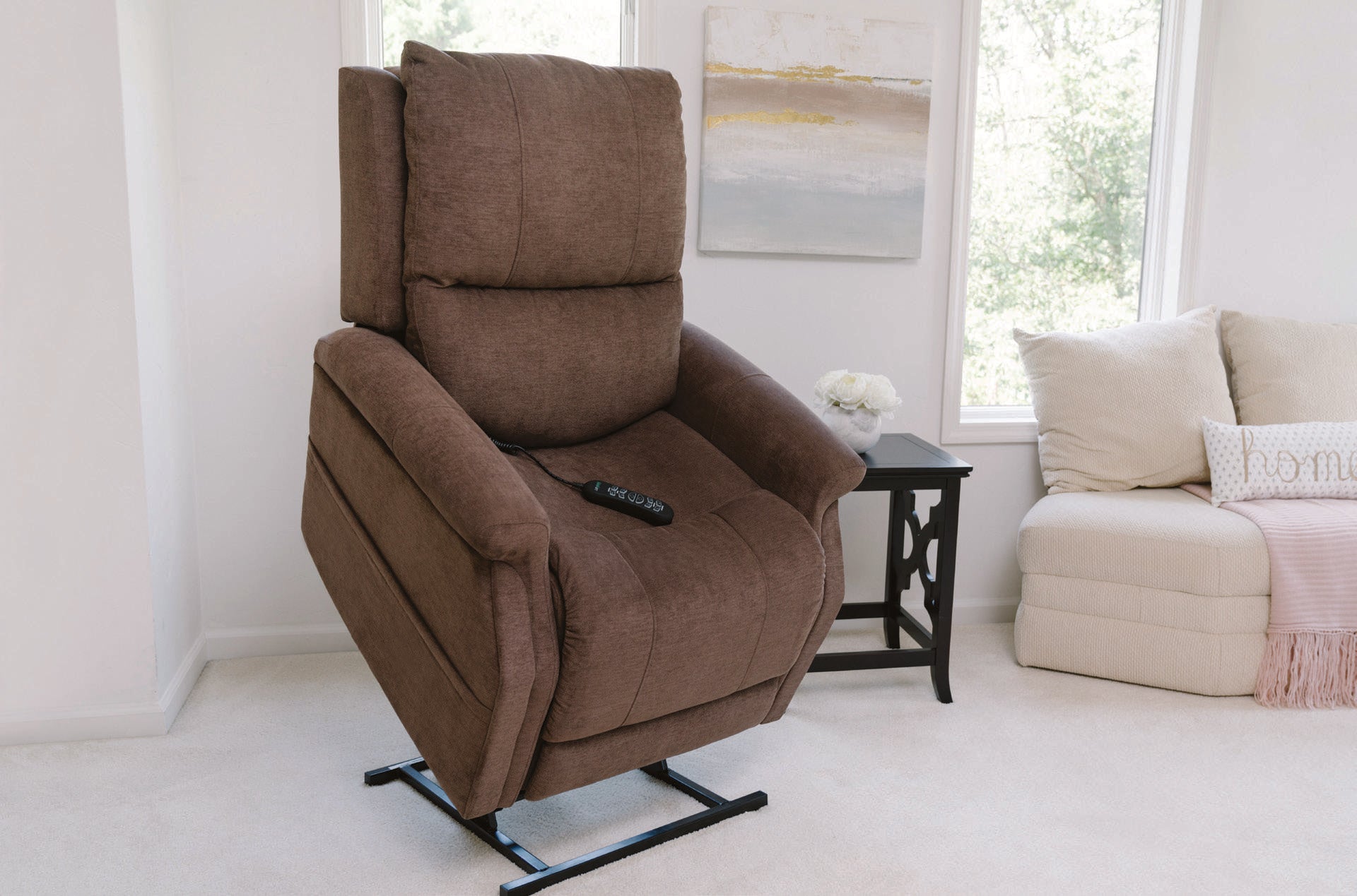 Pride VivaLift! Metro 2 lift chair in Saville Brown, raised in a bright living room